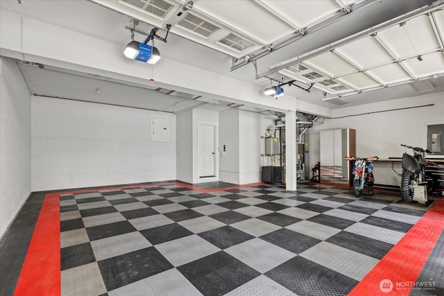 7320 111th Pl SE, Newcastle, WA 98056 - garage with a garage door opener, gas water heater, and electric panel
