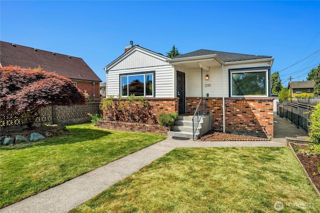 1210 S Mcclellan St, Seattle, WA 98144 - view of front of home featuring brick siding and a chimney