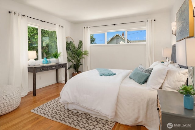 1210 S Mcclellan St, Seattle, WA 98144 - bedroom featuring wood finished floors