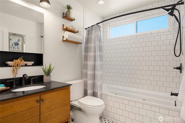 1210 S Mcclellan St, Seattle, WA 98144 - full bath featuring a combined bath / shower with jetted tub, vanity, and toilet