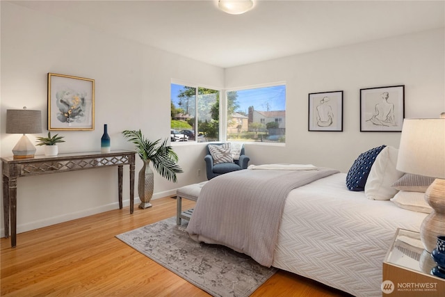 1210 S Mcclellan St, Seattle, WA 98144 - bedroom featuring wood finished floors