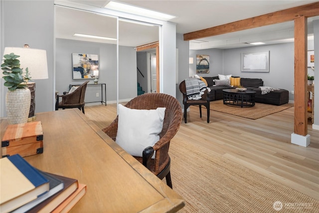 1210 S Mcclellan St, Seattle, WA 98144 - office featuring light wood-style flooring, beamed ceiling, and baseboards