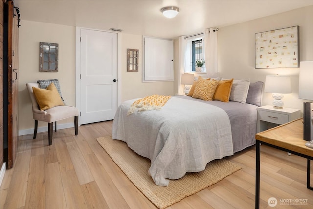 1210 S Mcclellan St, Seattle, WA 98144 - bedroom featuring light wood finished floors