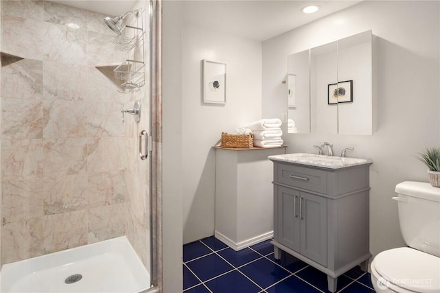 1210 S Mcclellan St, Seattle, WA 98144 - full bathroom featuring toilet, a shower stall, vanity, tile patterned flooring, and recessed lighting
