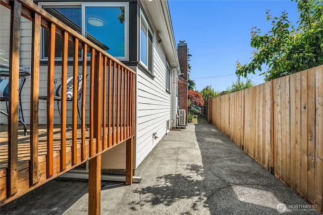 1210 S Mcclellan St, Seattle, WA 98144 - view of property exterior with cooling unit and a chimney