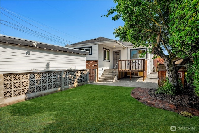 1210 S Mcclellan St, Seattle, WA 98144 - back of property with a wooden deck and stairway