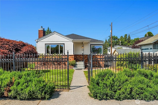 1210 S Mcclellan St, Seattle, WA 98144 - bungalow-style home with a chimney and brick siding