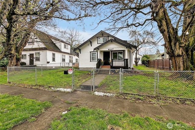4117 S M St, Tacoma, WA 98418 - view of front facade featuring covered porch and a gate