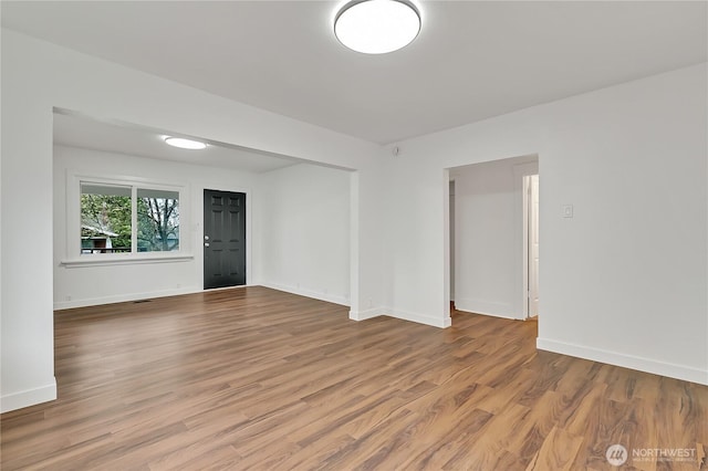 4117 S M St, Tacoma, WA 98418 - unfurnished room with wood finished floors and baseboards