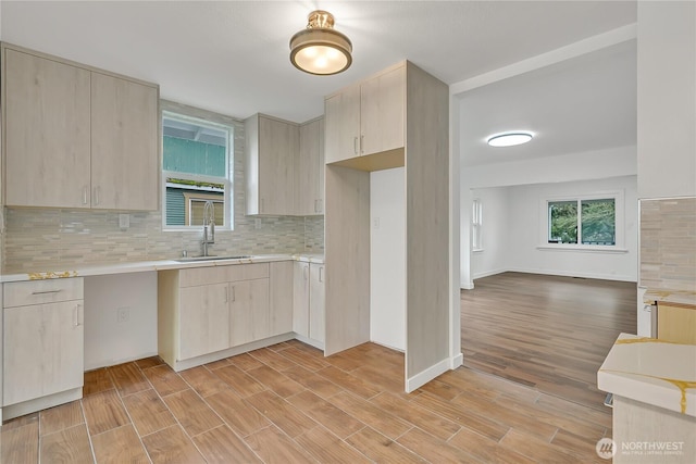 4117 S M St, Tacoma, WA 98418 - kitchen with a sink, light countertops, and light brown cabinets