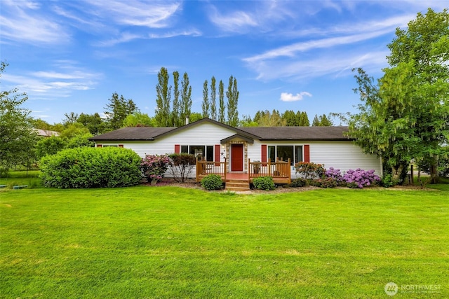 2957 Unick Rd, Ferndale, WA 98248 - single story home featuring a front yard and a deck