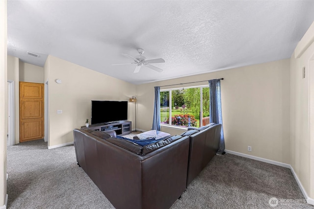 2957 Unick Rd, Ferndale, WA 98248 - carpeted living area with a ceiling fan, baseboards, and a textured ceiling