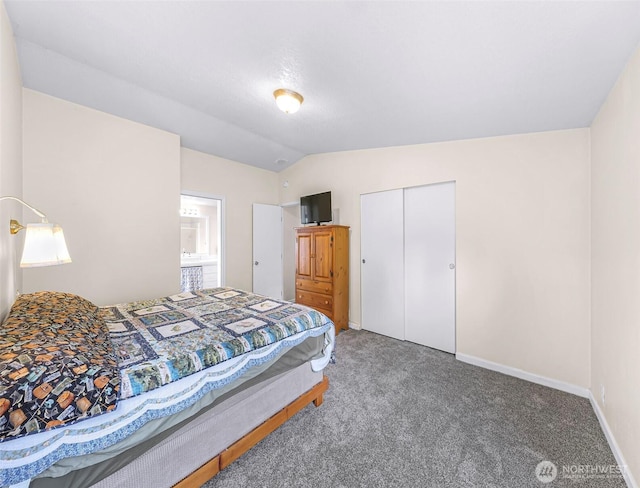 2957 Unick Rd, Ferndale, WA 98248 - carpeted bedroom featuring a closet, vaulted ceiling, and baseboards