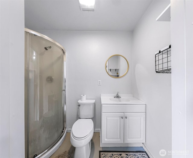 2957 Unick Rd, Ferndale, WA 98248 - bathroom with a stall shower, vanity, toilet, and baseboards