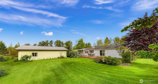2957 Unick Rd, Ferndale, WA 98248 - view of green lawn featuring a wooden deck
