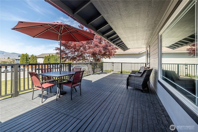 2438 Highland View Dr, East Wenatchee, WA 98802 - wooden terrace with outdoor dining space and a mountain view