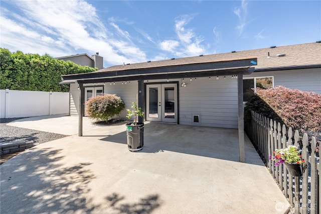 2438 Highland View Dr, East Wenatchee, WA 98802 - rear view of house featuring french doors, a patio, and a fenced backyard