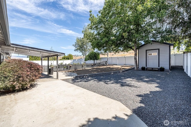 2438 Highland View Dr, East Wenatchee, WA 98802 - fenced yard with a storage shed and a patio area