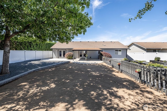 2438 Highland View Dr, East Wenatchee, WA 98802 - rear view of property with french doors, a patio area, and a fenced backyard