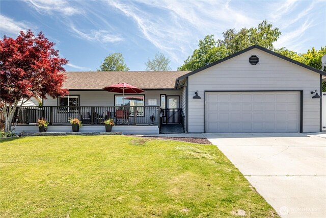 2438 Highland View Dr, East Wenatchee, WA 98802 - ranch-style house with an attached garage, concrete driveway, a front lawn, and a shingled roof