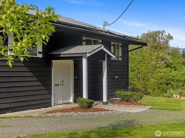 12020W Engebretsen Rd, Granite Falls, WA 98252 - doorway to property with a yard