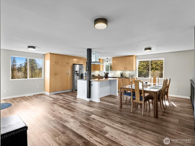 12020W Engebretsen Rd, Granite Falls, WA 98252 - dining space featuring healthy amount of natural light, dark wood-style flooring, and baseboards
