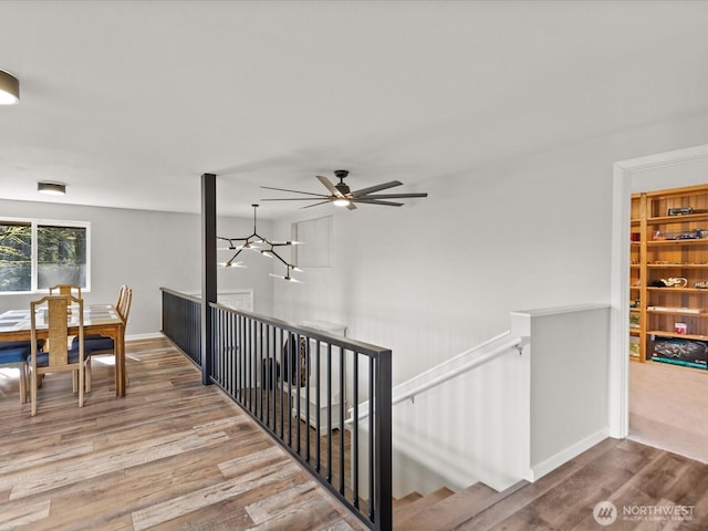 12020W Engebretsen Rd, Granite Falls, WA 98252 - stairway with wood finished floors and a ceiling fan
