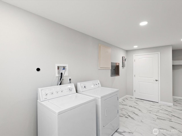 12020W Engebretsen Rd, Granite Falls, WA 98252 - laundry room featuring washer and clothes dryer, light marble finish flooring, recessed lighting, electric panel, and baseboards