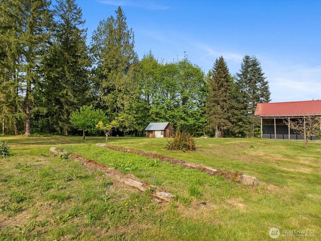 12020W Engebretsen Rd, Granite Falls, WA 98252 - view of grassy yard with an outdoor structure and an outbuilding