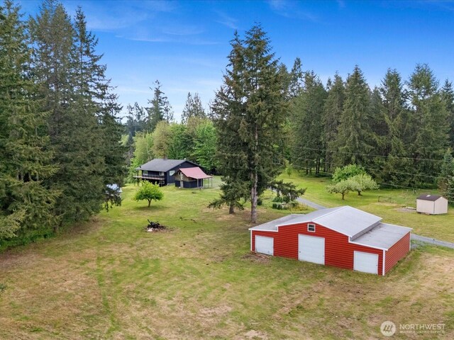 12020W Engebretsen Rd, Granite Falls, WA 98252 - aerial view of property and surrounding area featuring a heavily wooded area