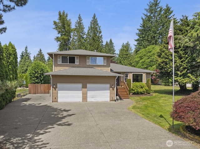 5208 S 380th St, Auburn, WA 98001 - split level home with driveway, a garage, and stairs