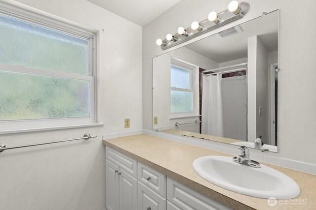 5208 S 380th St, Auburn, WA 98001 - full bath featuring vanity and a shower with shower curtain