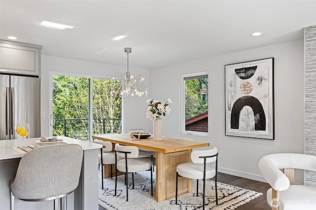 3435 103rd Pl NE, Bellevue, WA 98004 - dining room with plenty of natural light, dark wood-style floors, recessed lighting, baseboards, and a chandelier