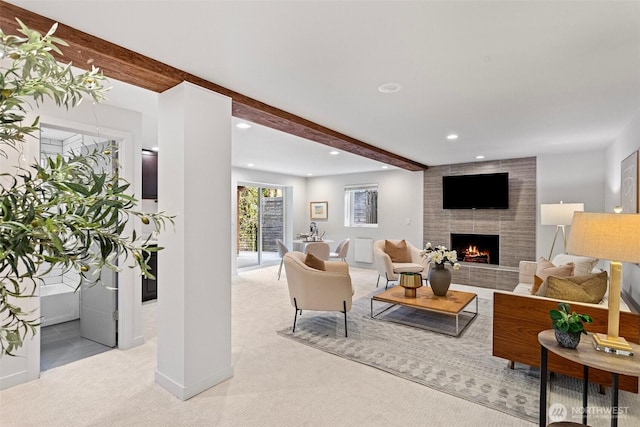 3435 103rd Pl NE, Bellevue, WA 98004 - living area with beam ceiling, carpet floors, recessed lighting, a tiled fireplace, and baseboards