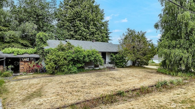 9139 Burnett Rd SE, Yelm, WA 98597 - view of front of house featuring roof with shingles