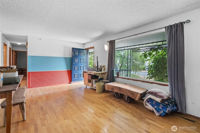 9139 Burnett Rd SE, Yelm, WA 98597 - living area with wood finished floors and a textured ceiling