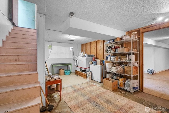 9139 Burnett Rd SE, Yelm, WA 98597 - finished basement featuring stairs, washing machine and dryer, and a textured ceiling