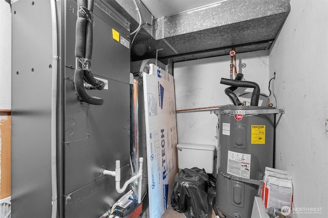 9139 Burnett Rd SE, Yelm, WA 98597 - utility room with strapped water heater and heating unit