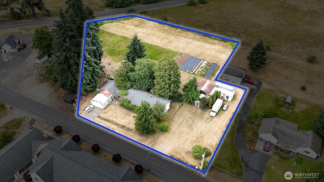 9139 Burnett Rd SE, Yelm, WA 98597 - aerial overview of property's location with property boundaries highlighted
