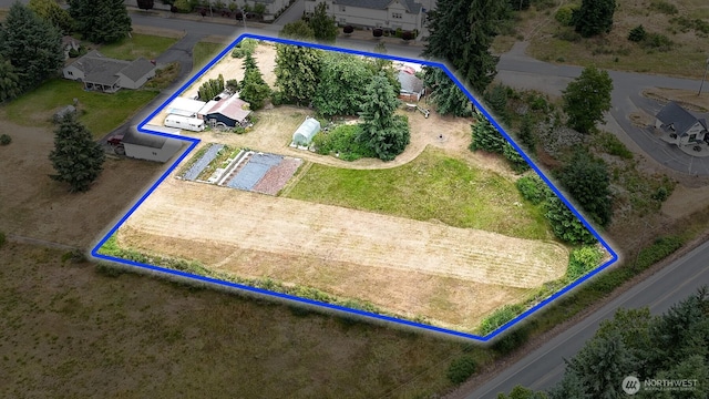 9139 Burnett Rd SE, Yelm, WA 98597 - aerial overview of property's location with property parcel outlined