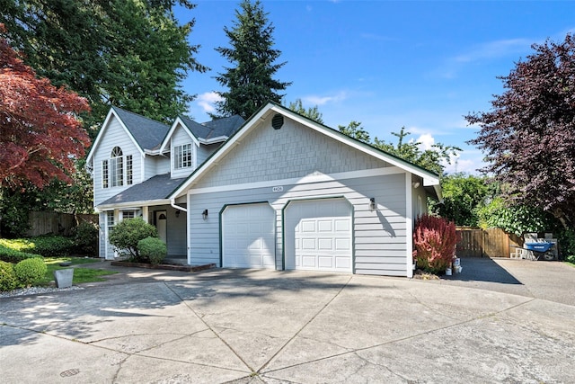 4426 82nd Avenue Ct W, University Place, WA 98466 - view of front of house with driveway, a garage, and roof with shingles