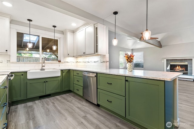 4426 82nd Avenue Ct W, University Place, WA 98466 - kitchen featuring green cabinetry, dishwasher, a sink, a peninsula, and ceiling fan