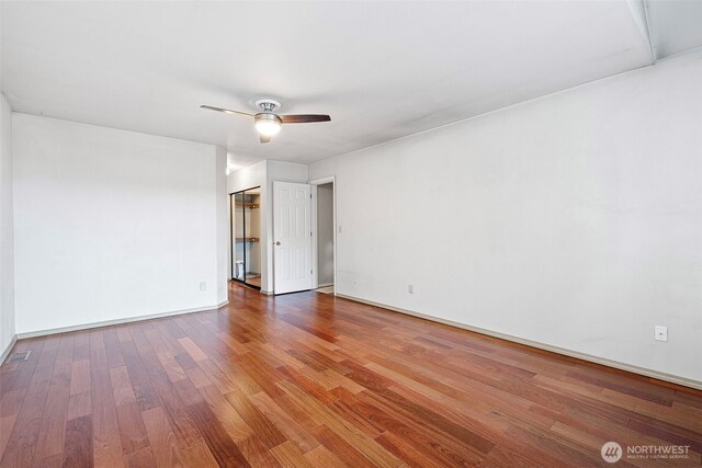 4426 82nd Avenue Ct W, University Place, WA 98466 - spare room featuring ceiling fan, wood finished floors, and baseboards
