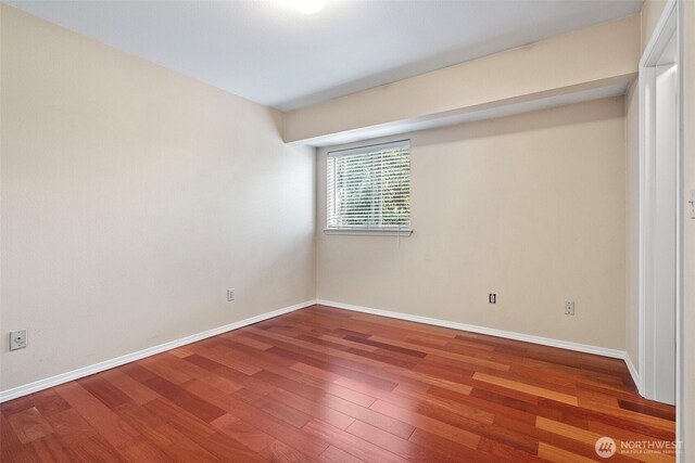 4426 82nd Avenue Ct W, University Place, WA 98466 - empty room featuring wood finished floors and baseboards