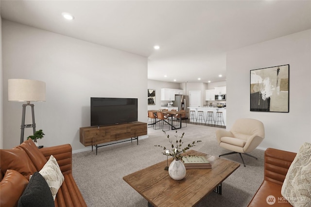 7402 281st Pl NW Unit 75, Stanwood, WA 98292 - living room featuring light colored carpet and recessed lighting