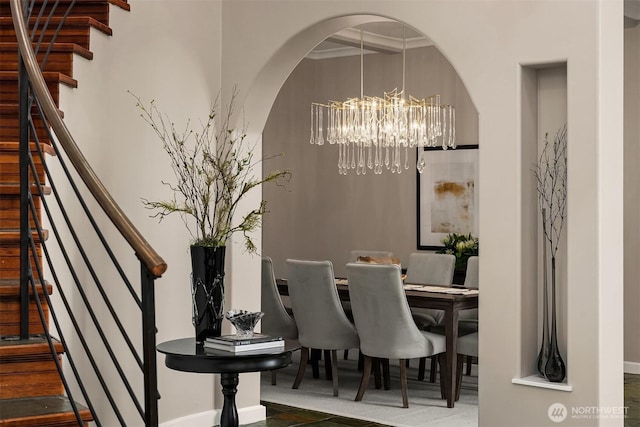 6819 SE 32nd St, Mercer Island, WA 98040 - dining area with stairs, a chandelier, and arched walkways