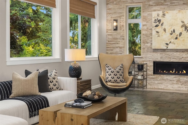 6819 SE 32nd St, Mercer Island, WA 98040 - living area featuring plenty of natural light, wood-type flooring, and a fireplace