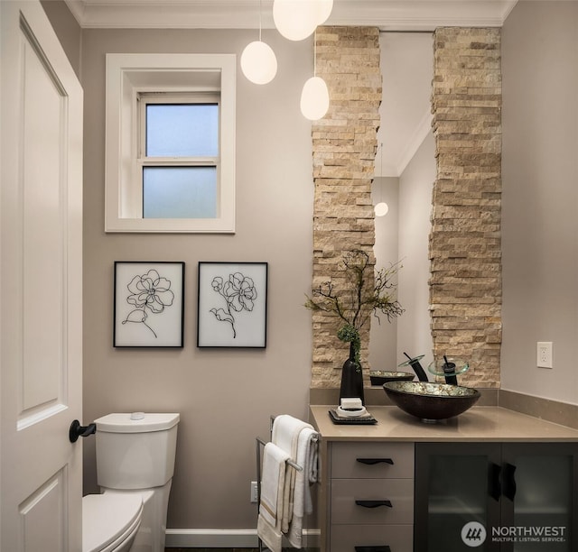 6819 SE 32nd St, Mercer Island, WA 98040 - half bathroom featuring toilet, vanity, and ornamental molding