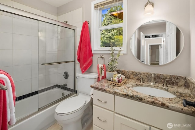 6819 SE 32nd St, Mercer Island, WA 98040 - full bathroom featuring toilet, vanity, and bath / shower combo with glass door