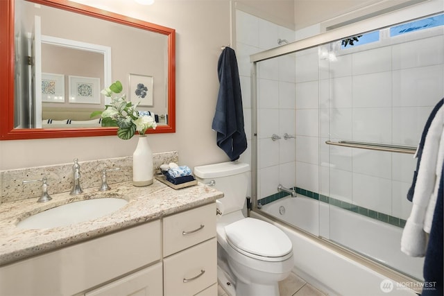 6819 SE 32nd St, Mercer Island, WA 98040 - full bathroom featuring toilet, vanity, and bath / shower combo with glass door